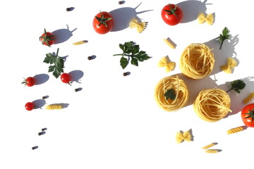 Three spaghetti in the form of a nest with vegetables and spices lie on a white background.
