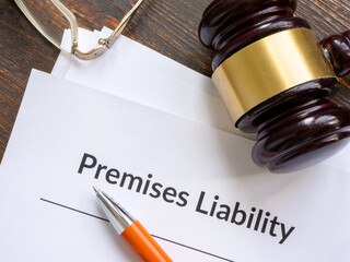 Documents about premises liability and pen. - obrazy, fototapety, plakaty