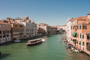 Fototapeta na wymiar Scenic view of the Grand Canal in Venice, Italy, showcasing its beauty and tranquility. The specific angle, time of day, and types of boats are unspecified.