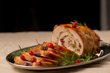 Christmas roll of turkey fillet stuffed with mushrooms and cheese