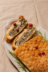 Christmas vegetarian pie Wellington stuffed with mushrooms