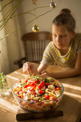 The girl is preparing vegetables
