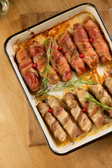 Traditional Christmas dish Sausages wrapped in bacon