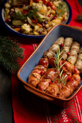 Traditional Christmas dish Sausages wrapped in bacon