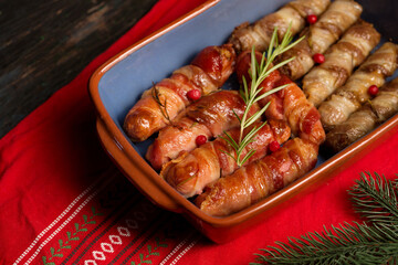 Traditional Christmas dish Sausages wrapped in bacon