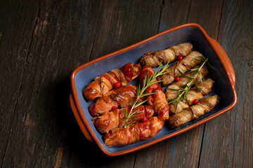 Traditional Christmas dish Sausages wrapped in bacon