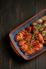 Traditional Christmas dish Sausages wrapped in bacon