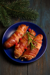 Traditional Christmas dish Sausages wrapped in bacon