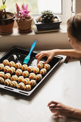 The girl prepares a Christmas dish 