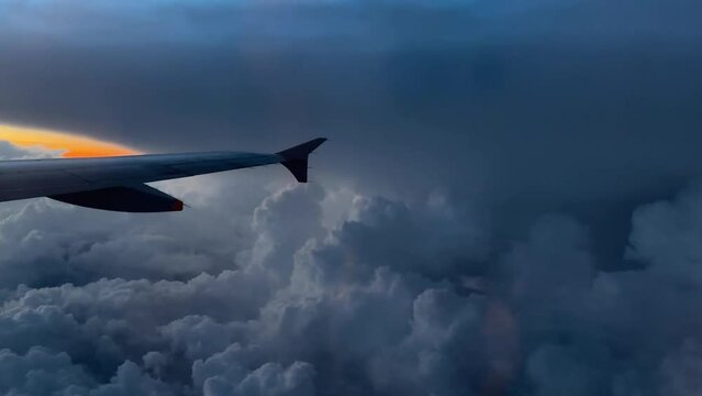 Aircraft Wing Flying in Sky Clouds Lightning Strike