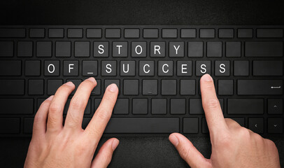 Story of success. Hand typing on desktop office computer keyboard. Writer typing on a computer or...