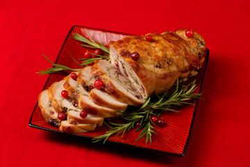 Christmas roll of turkey fillet stuffed with mushrooms and cheese