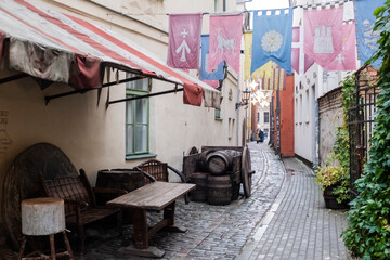 Medieval decoration on a cobble stone street on an ancient scene in Riga, Latvia