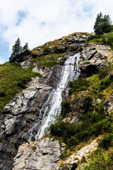 Capra waterfall also known as Iezerului waterfall, located on the southern slope of the Făgăras Mountains, right next to Transfagarasan, between Cabra Capra and Balea Lake, on DN7C. Romania.