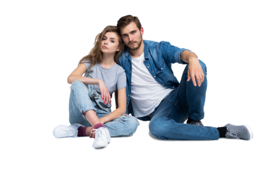 Portrait Of Happy Young Couple Sitting On Floor Leaning Against Wall on transparent background - Powered by Adobe