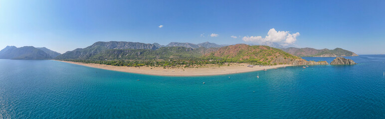 Fototapeta na wymiar Captured the breathtaking beauty of Cirali Beach in Antalya, Turkey on a spectacular summer day in 2023, using a drone to explore the coastline and the majestic mountains in the background.