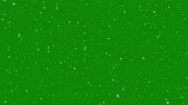 Snow flakes overlay, green screen background. Winter, slowly falling snow effect