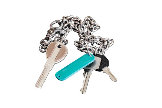 A bunch of keys on a chain, isolated on a white background