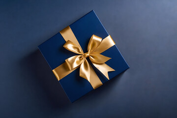 Dark blue gift box with gold satin ribbon