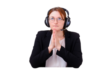A woman prays to God at a computer during isolation due to a coronavirus, isolated on a white background. Religion and confession in online video call to the priest of the Church under quarantine