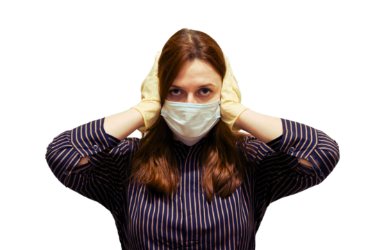 A young woman in a medical mask covered her ears against a black-and-yellow barrier, isolated on a white background. Siren and sound warning of problems