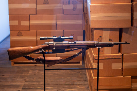 View of the Interior of the Sixth Floor Museum at Dealey Plaza in the former Texas School Book Depository in Dallas, Texas. Replica of the gun of the murder