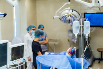 Professional surgeon technology. Surgery teamwork at modern hospital room.