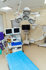 Hospital operation interior with table and lamp. Modern clinic surgery room.