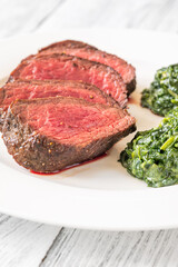 Flank steak with creamy spinach