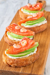 Sandwiches with avocado and salmon
