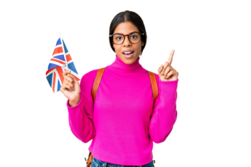 Young African American woman holding an United Kingdom flag over isolated chroma key background thinking an idea pointing the finger up