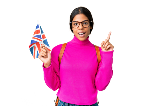 Young African American woman holding an United Kingdom flag over isolated chroma key background thinking an idea pointing the finger up