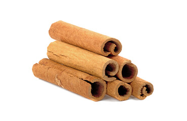 Pile of cinnamon sticks isolated on white background