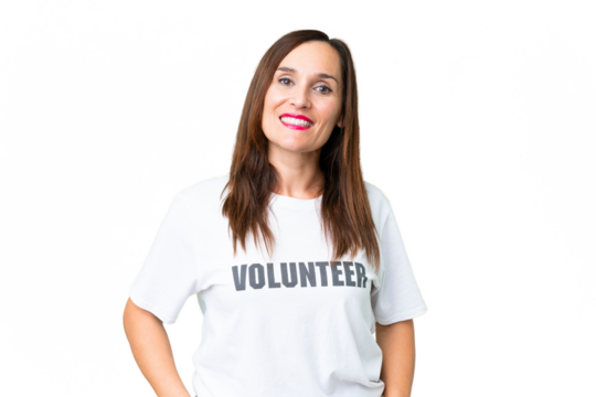Middle age volunteer woman over isolated chroma key background laughing