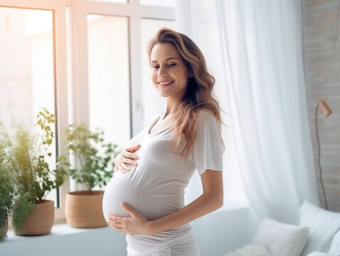 Pregnant Woman Smiling in Room with Window