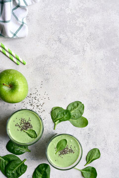 Fresh apple spinach smoothy for a breakfast. Top view with copy space.