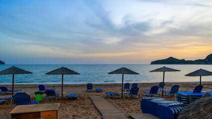 Sunset over the sea and the bay of Agios Georgios on the island of Corfu