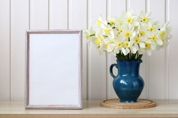 a bouquet with yellow daffodils, flowers and an empty space for your text. copy space. spring, rural composition, cottage core. empty frame.
