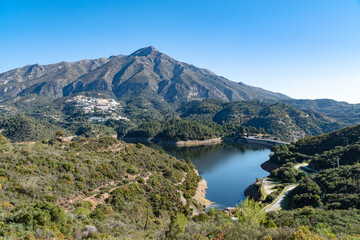 Fototapeta na wymiar a view overlooking the reservoir and dam found behind Marbella in Andalucia.