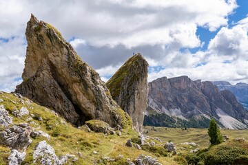 Fototapeta na wymiar some big rocks that are in the grass on a mountain: Italy, Dolomites mountains