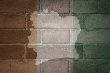 map and flag of cote divoire on a old brick wall