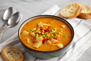 Homemade Corn Chowder in a Bowl, side view.