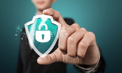 Cyber security. Businessman holding shield icon