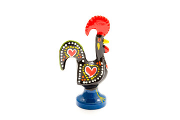 Rooster of Barcelos souvenire on white background, studio photo