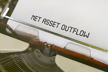 The text is printed on a typewriter - net asset outflow