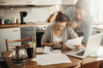 Young couple reading bad financial report having financial debt at home