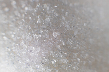 White sugar in particles super close up, macro