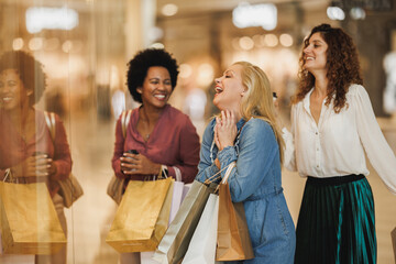 Women Friends Having Fun Shopping