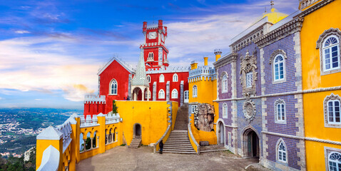 Most famous tourist destinations and landmarks of Portugal - colorful Pena palace (castle) Unesco heritage site - obrazy, fototapety, plakaty