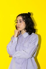 Young latin woman thinking gesture. beautiful woman on isolated background with thoughtful expression